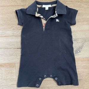 Dark blue romper. Collar & button top. Clasp bottom.